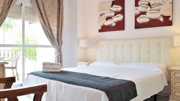 4 habitaciones, tabla de planchar con plancha, wifi y ropa de cama