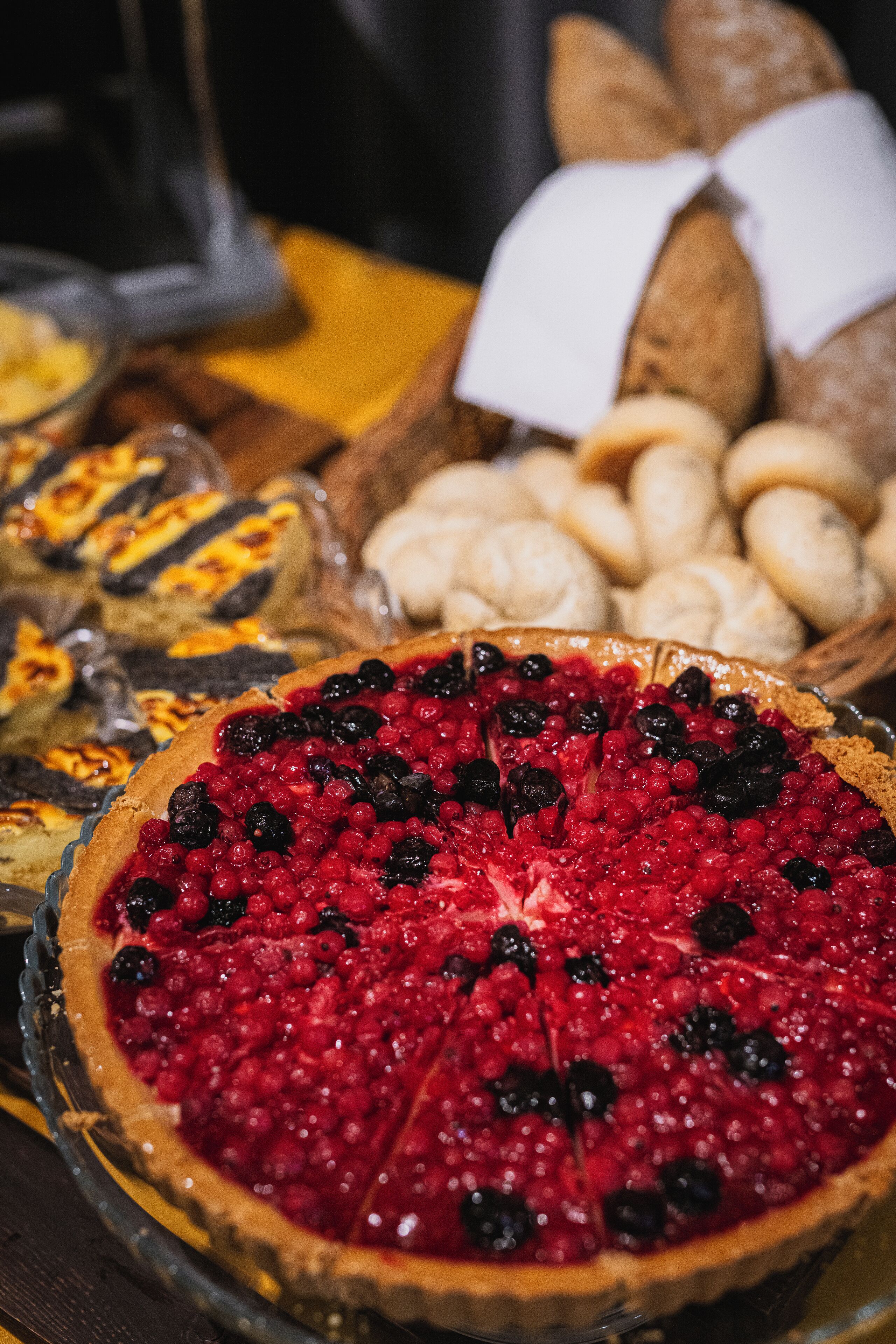 A variety of pies and pastries on a table.