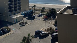 A hotel with a view of the beach and ocean.