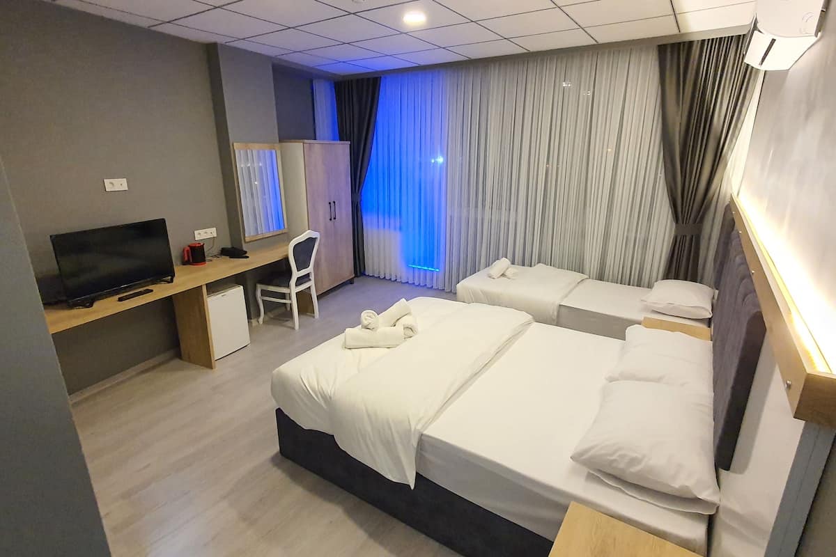 family triple room | premium bedding, minibar, free wifi, bed sheets