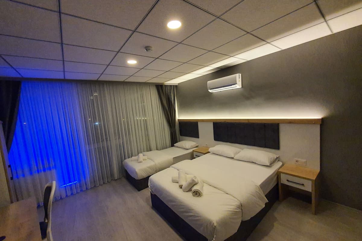 family triple room | premium bedding, minibar, free wifi, bed sheets