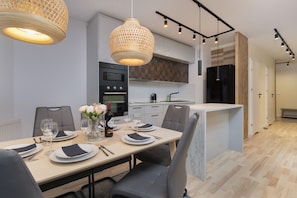Apartment, 3 Bedrooms, 2 Bathrooms, Sea View | Private kitchen | Microwave, dishwasher, coffee/tea maker, highchair