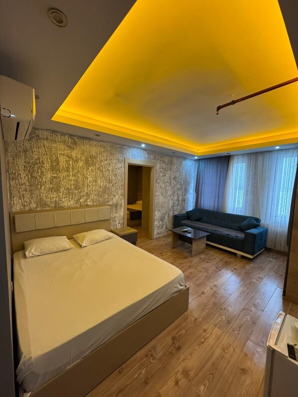 Family Quadruple Room | Premium bedding, minibar, individually furnished, desk