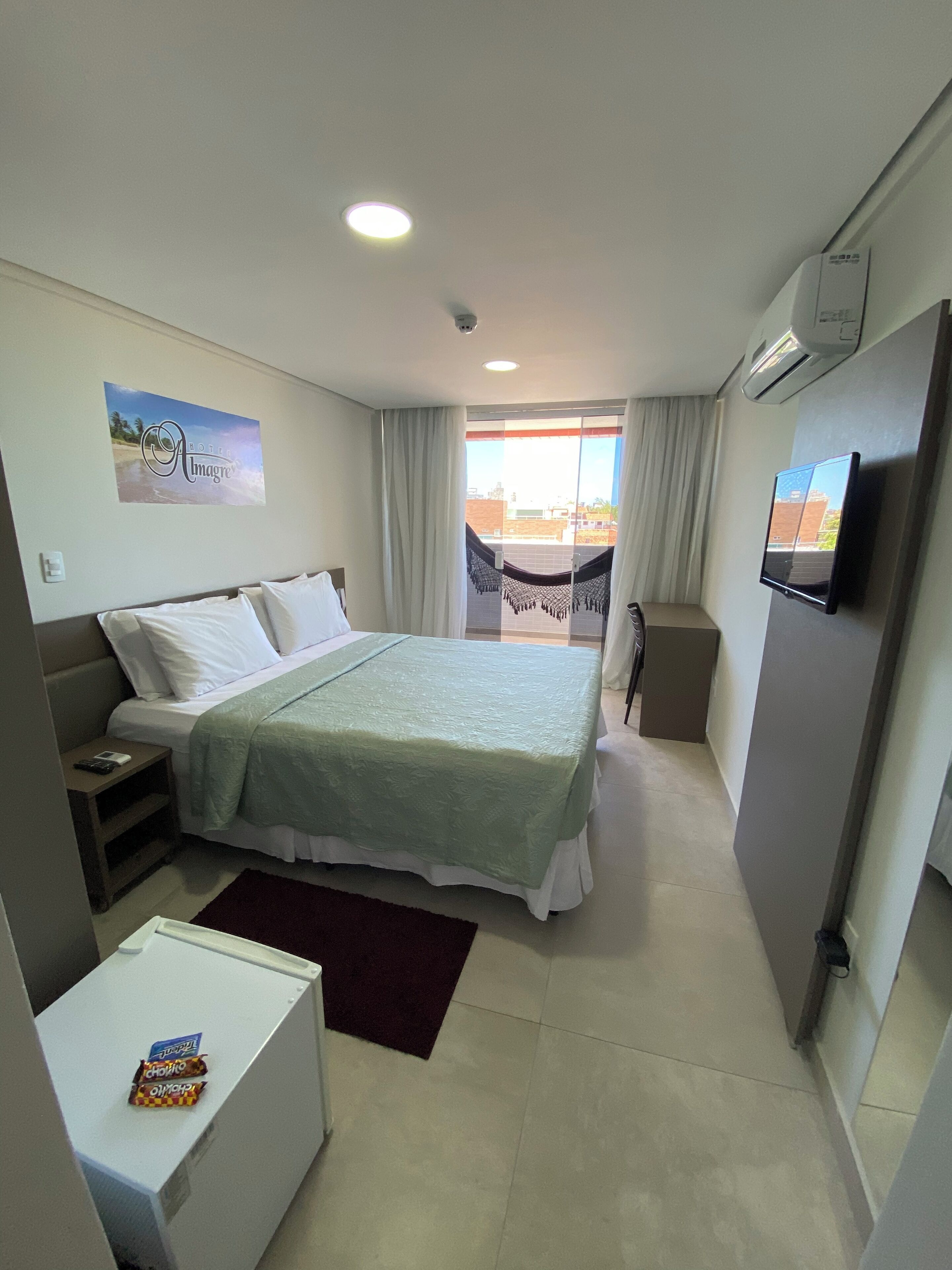 SUITE LATERAL COM VISTA PARCIAL MAR | Wi-Fi gratis dan seprai linen