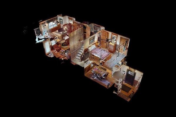 A compact, multi-level apartment with a kitchen, dining area, and a bedroom with a bed and a desk. - PET FRIENDLY 2br/2ba Tree Top -walk to ski/village (Snowshoe)