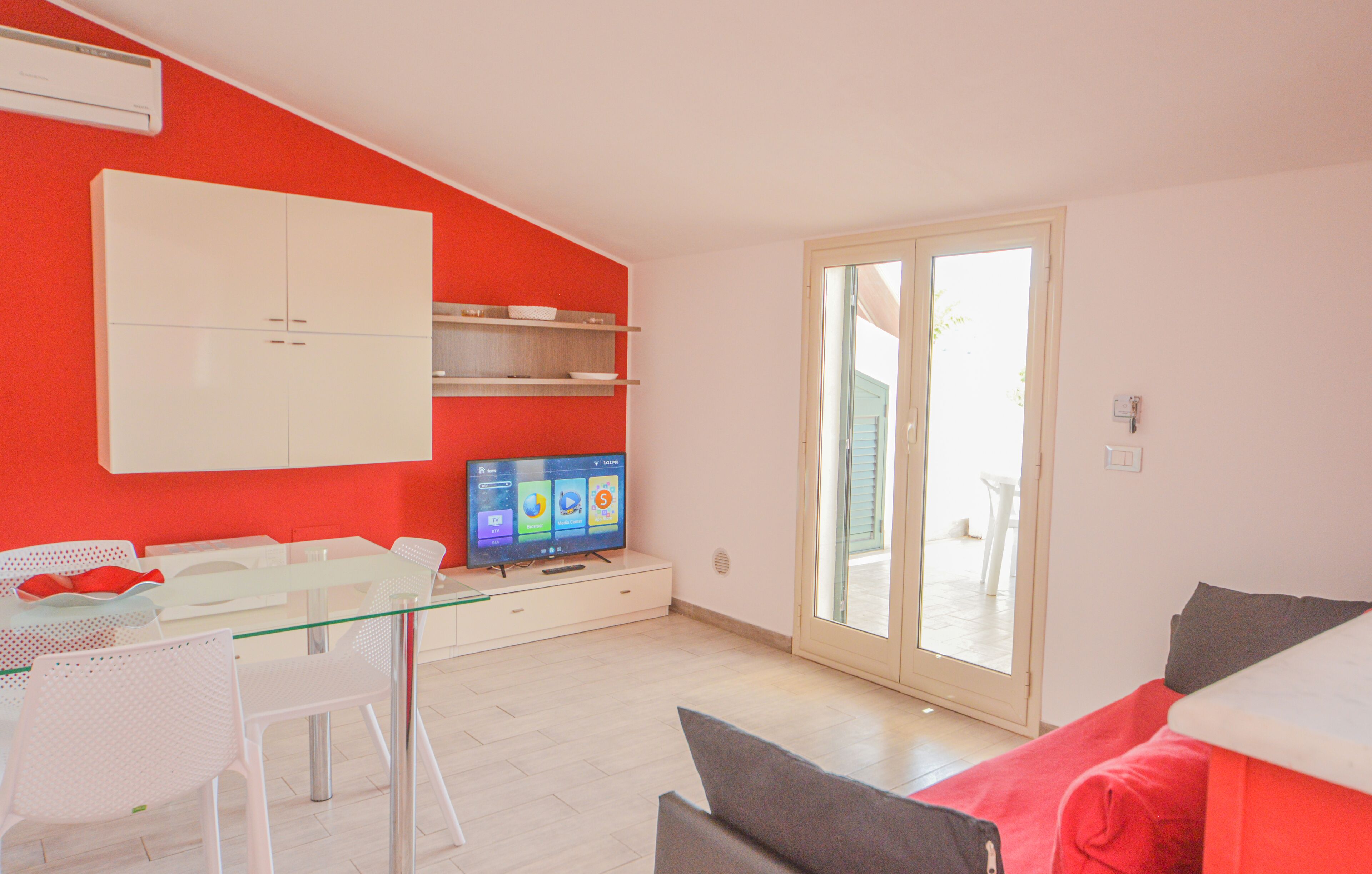 Suite Olimpo | Area soggiorno | TV, stampante
