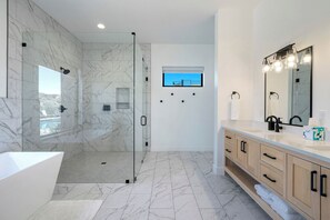 Bathtub, hair dryer, towels