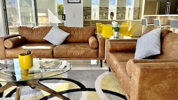 Villa | Living area | 30-inch TV with cable channels, fireplace