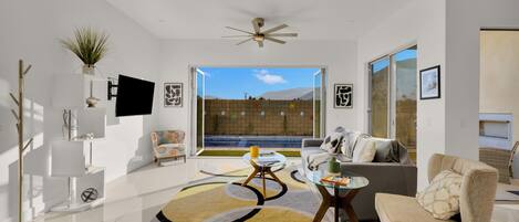 Villa | Living area | 30-inch TV with cable channels, fireplace