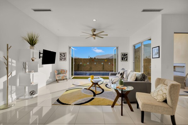 Villa | Living area | 30-inch TV with cable channels, fireplace