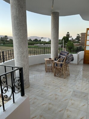 Apartment, 2 Queen Beds | Outdoor dining - Lemon Tree Guest House and Swimming Pool (Luxor)