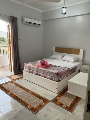 Apartment, 2 Queen Beds | 2 bedrooms, free WiFi, bed sheets - Lemon Tree Guest House and Swimming Pool (Luxor)