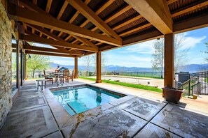 Relax by the pool with a breathtaking mountain view.