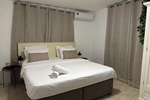 3 kamar tidur, setrika/meja setrika, Wi-Fi gratis, dan seprai linen
