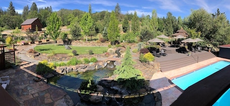 Seasonal outdoor pool, open 7:00 AM to 8:00 PM, pool umbrellas. Country Willows Inn and Estate