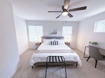 Discover the Cozy and Spacious Second Bedroom Upstairs with a King Bed.