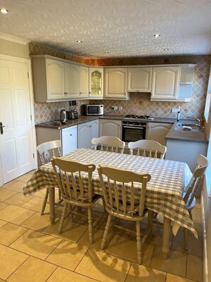 House, Multiple Beds | Private kitchen