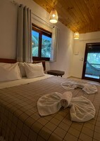 Family Room | Minibar, blackout drapes, free WiFi, bed sheets