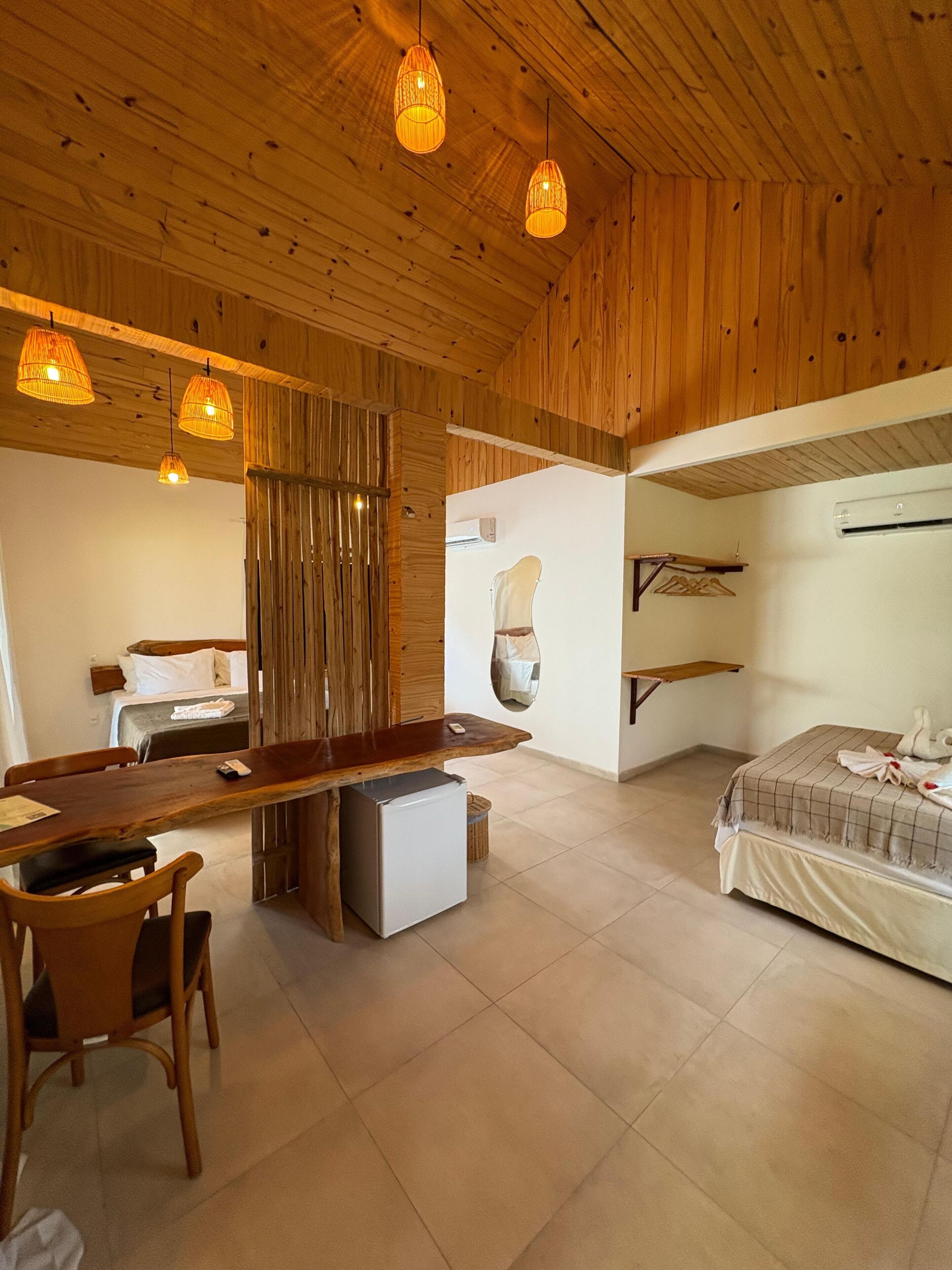 Family Room | Minibar, blackout drapes, free WiFi, bed sheets