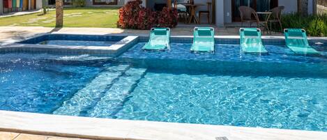 Indoor pool, open 9:00 AM to 8:00 PM, pool umbrellas