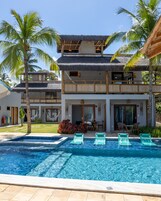 Indoor pool, open 9:00 AM to 8:00 PM, pool umbrellas