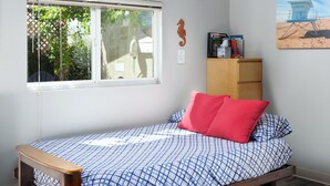 1 bedroom, desk, iron/ironing board, travel crib