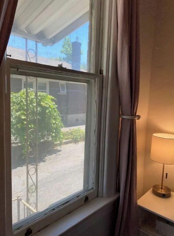 Enjoy a peaceful view of the surrounding neighborhood from the window.