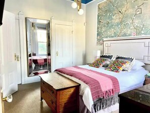1 bedroom, desk, iron/ironing board, travel crib
