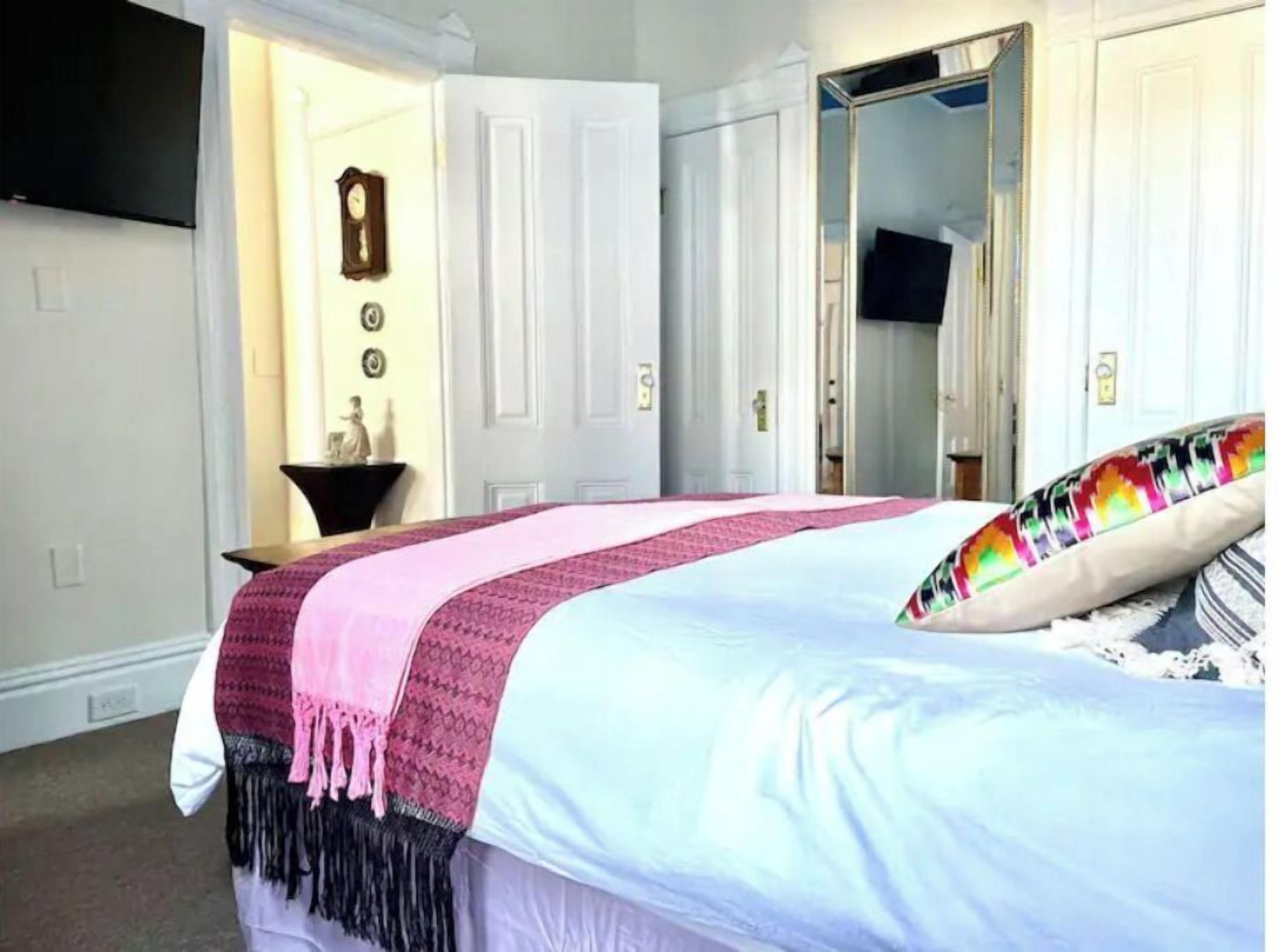 1 bedroom, desk, iron/ironing board, travel crib