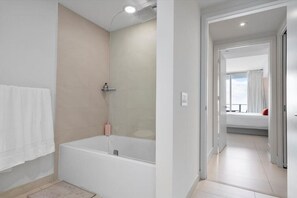 Bathtub, hair dryer, towels