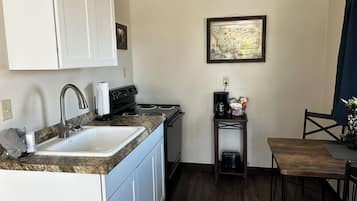 Fridge, microwave, oven, cookware/dishes/utensils