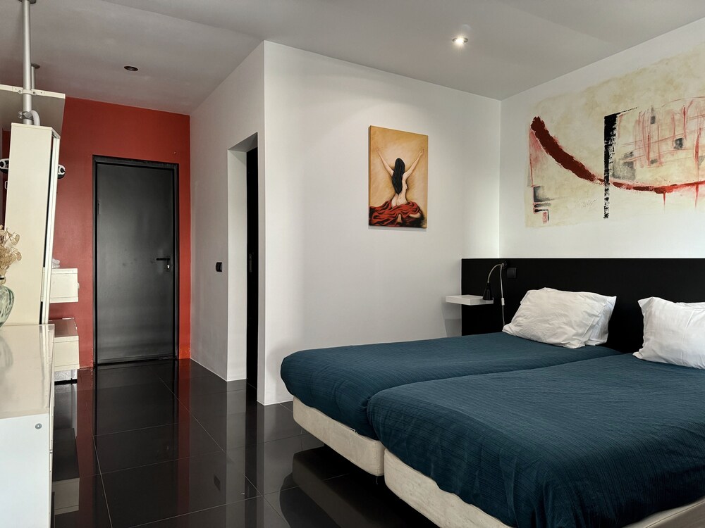 Twin Studio — quarto verde