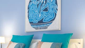 Tabla de planchar con plancha, wifi gratis, ropa de cama