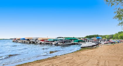 Riverfront golf resort condo with pool, hot tub, volleyball, & fairway-view deck