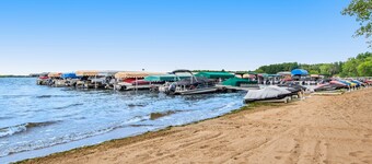 Riverfront golf resort condo with pool, hot tub, volleyball, & fairway-view deck