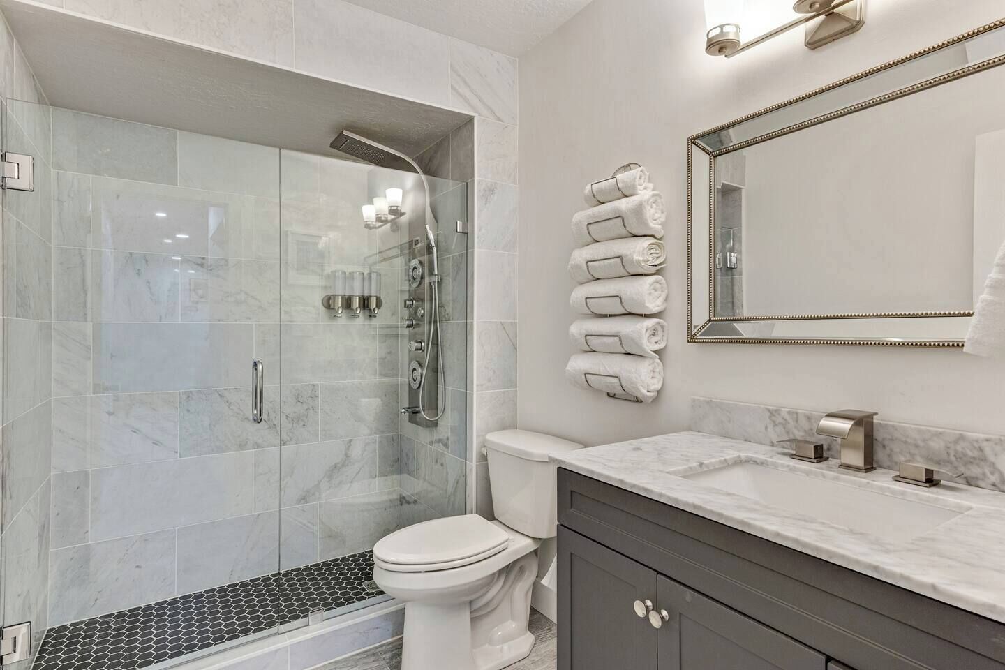 Shower, hair dryer, towels, soap
