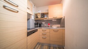 Fridge, microwave, dishwasher, coffee/tea maker