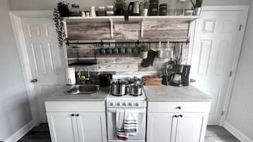 Fridge, microwave, stovetop, coffee/tea maker