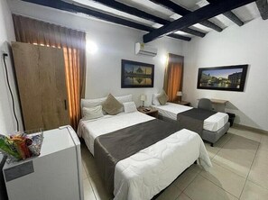Superior Triple Room | Hypo-allergenic bedding, down comforters, minibar, in-room safe