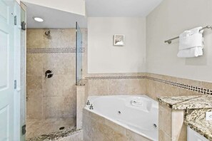 Shower, hair dryer, towels, shampoo