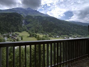 A mountain landscape with a village below. - Le Bionnassay by Interhome (Les Contamines)