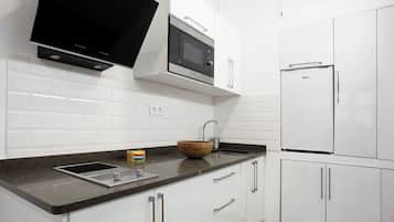 Fridge, microwave, stovetop, coffee/tea maker