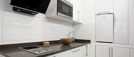 Fridge, microwave, stovetop, coffee/tea maker