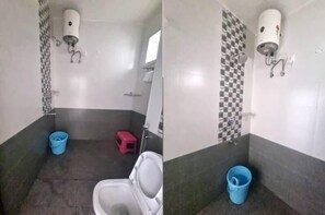 A bathroom with a toilet, a blue bucket, a red stool, and a wall-mounted hand dryer. - PPH Living KVR Residency (Tada)