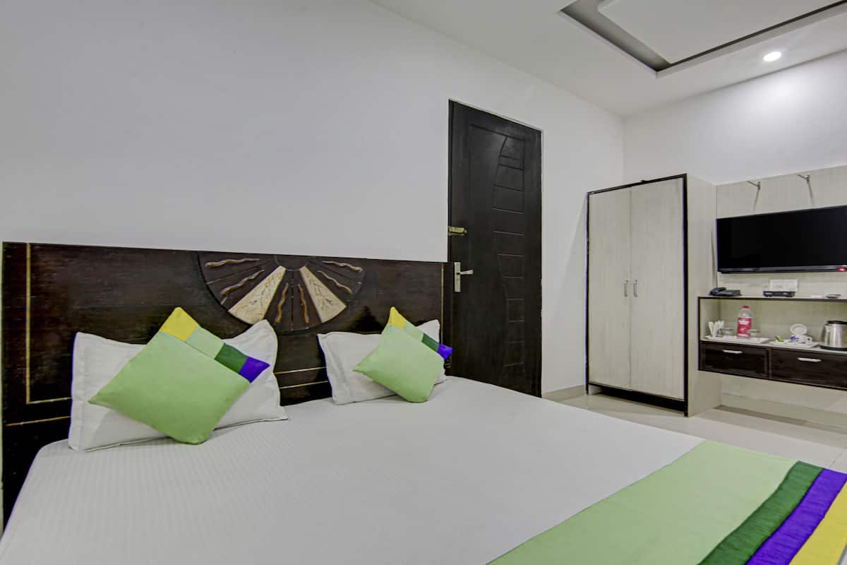 Economy Room | Desk, iron/ironing board