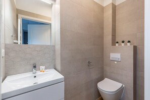 Een douche, gratis toiletartikelen