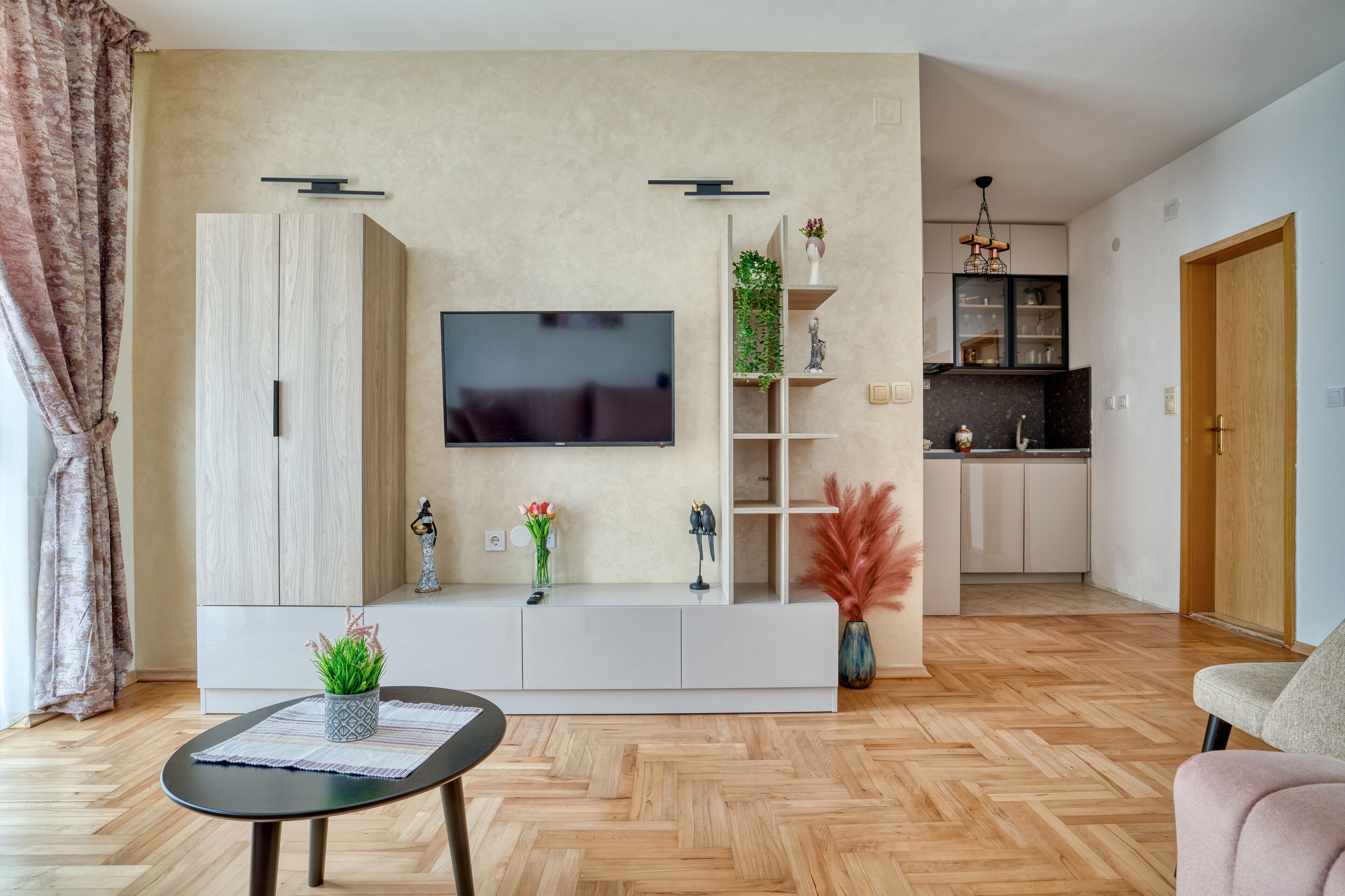 Deluxe Apartment | Living area | 55-inch Smart TV with satellite channels, TV