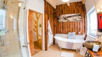 Bathtub, hair dryer, towels, soap