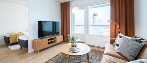 Appartamento Superior, sauna, vista lago parziale | Area soggiorno