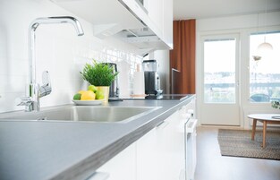 Superior Apartment, Sauna, Partial Lake View | Private kitchen | Full-size fridge, microwave, oven, stovetop